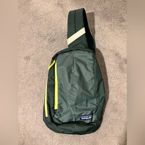 Patagonia ultralight black hole Sling Bag green with Yellow Accents